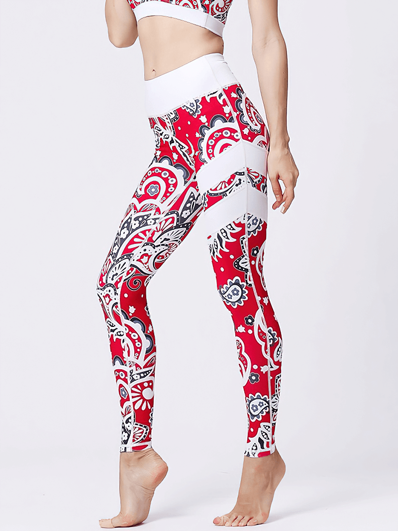 Women's high-waist sports leggings with floral print, stretchy and breathable nylon-spandex blend, perfect for yoga or fitness.